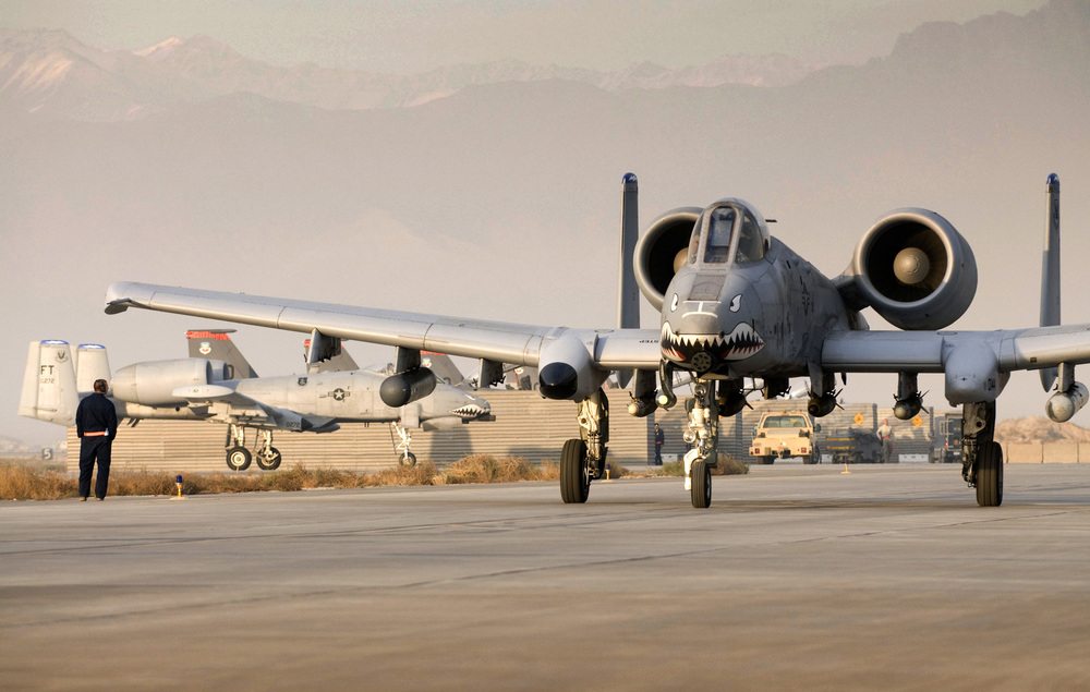 An A-10 Thunderbolt II, piloted by Capt. Eric Fleming, prepares for takeoff at Bagram Air Field, Afghanistan, Dec. 2. The teeth painted on the nose of the aircraft symbolizes the legacy of the fighter squadron, dating back to the famous "Flying Tigers" of WWII. (U.S. Air Force photo by Staff Sgt. Samuel Morse)(Released)