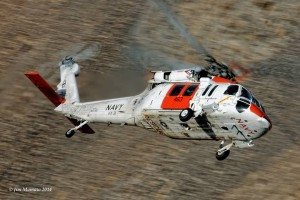 VX-31's Rescue copter comes through the canyon, training for any situation