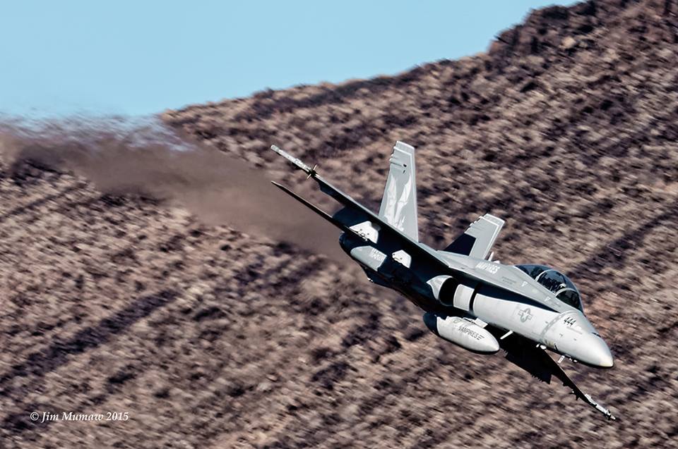 Hornet from VX-9 Vampires, China Lake, dives into the canyon to begin its low level.