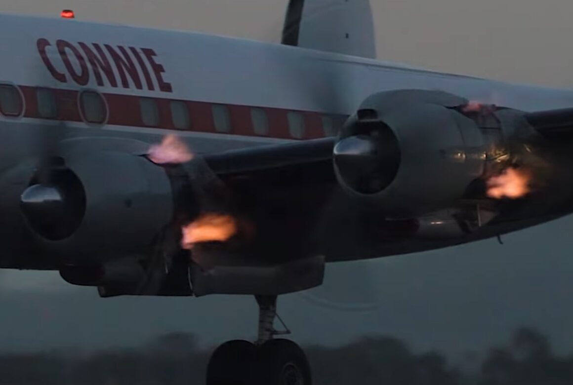 Fire spits out of the Lockheed L-1049 Super Constellation during departure