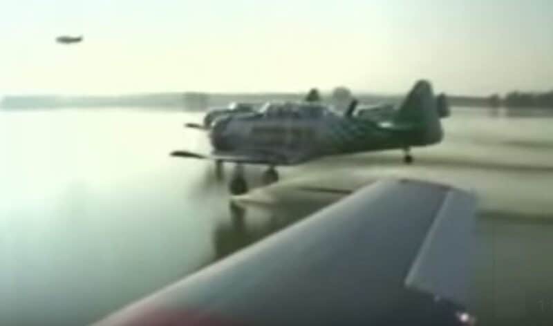 Watch These Steely T-6 Pilots Water Ski Their Plane Across a Lake