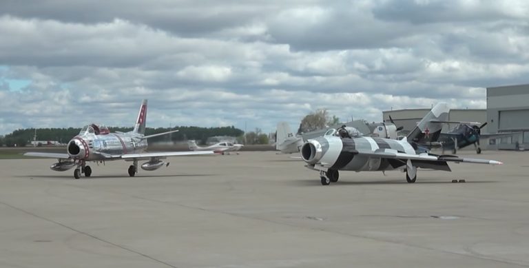 A Mig and a Sabre Fly Together At The Gathering of Warbirds