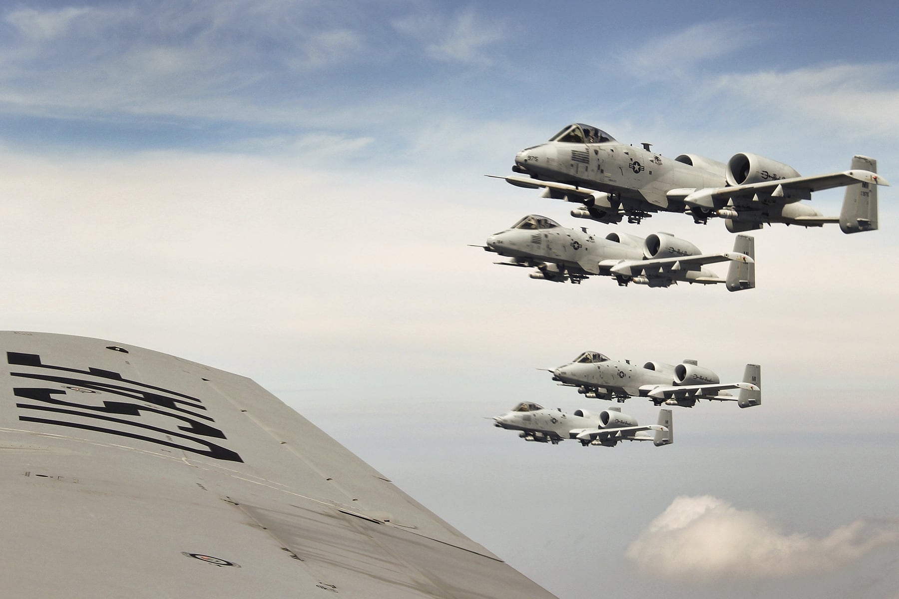 A-10C Thunderbolts flying in formation.