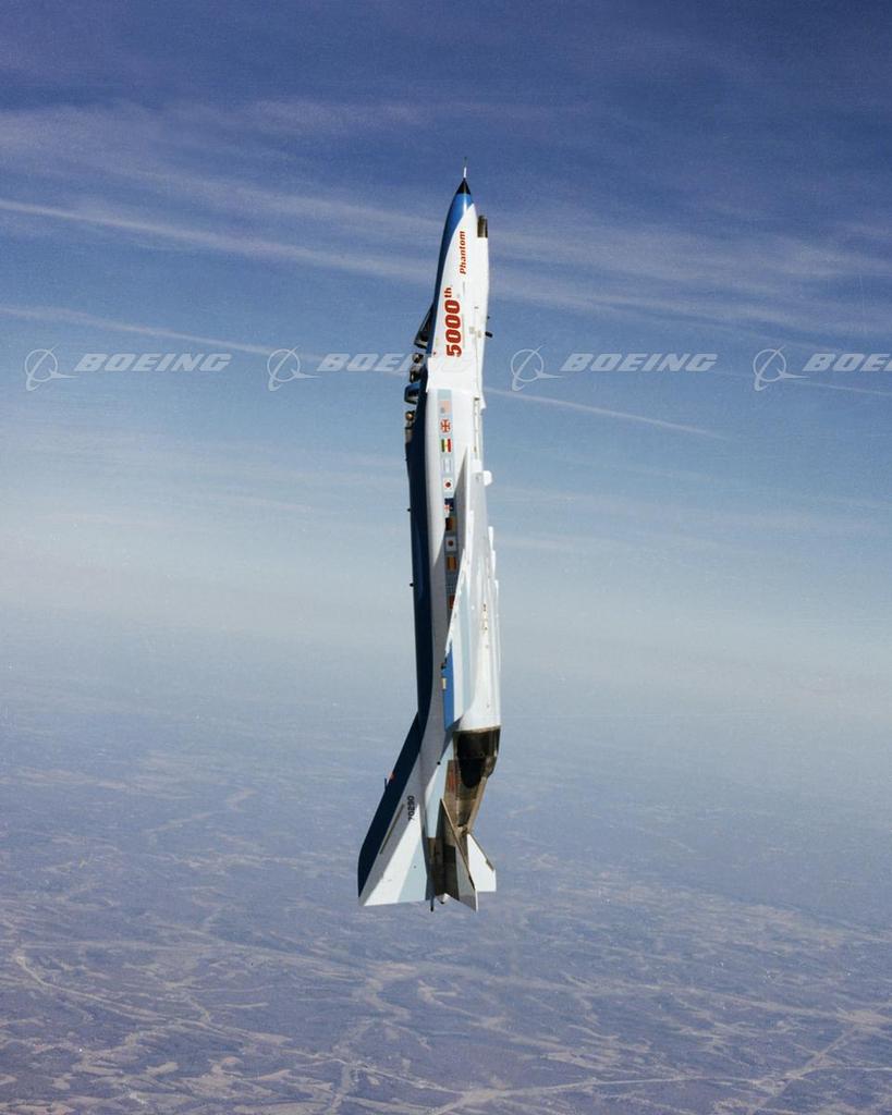 F-4  Phantom flying vertically.