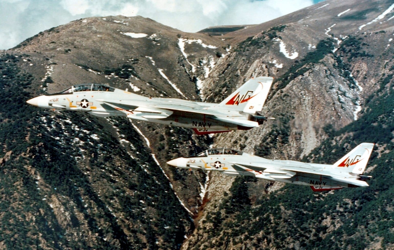 Two of the F-14 Tomcat aircraft in flight.