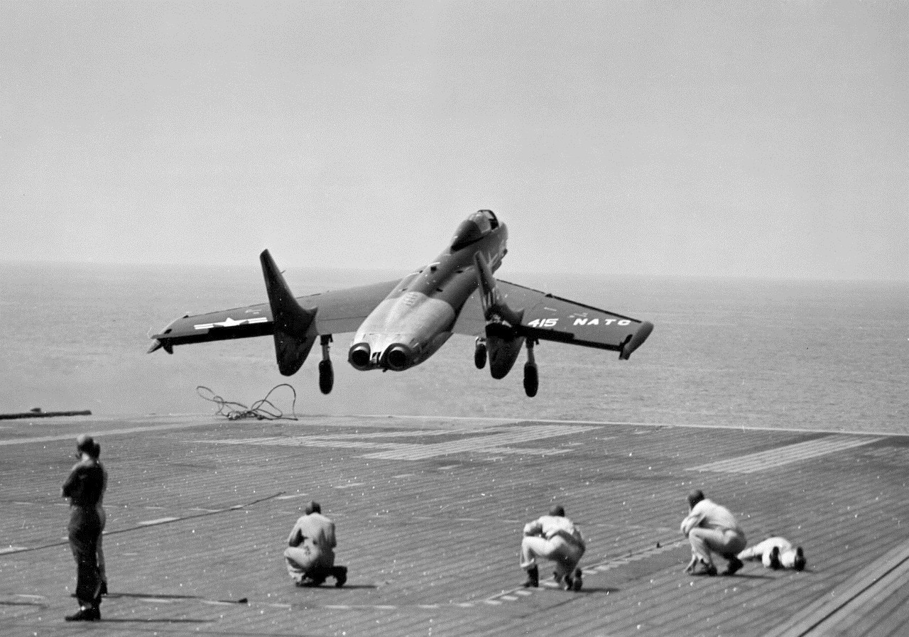 Cutlass taking off from an aircraft carrier.
