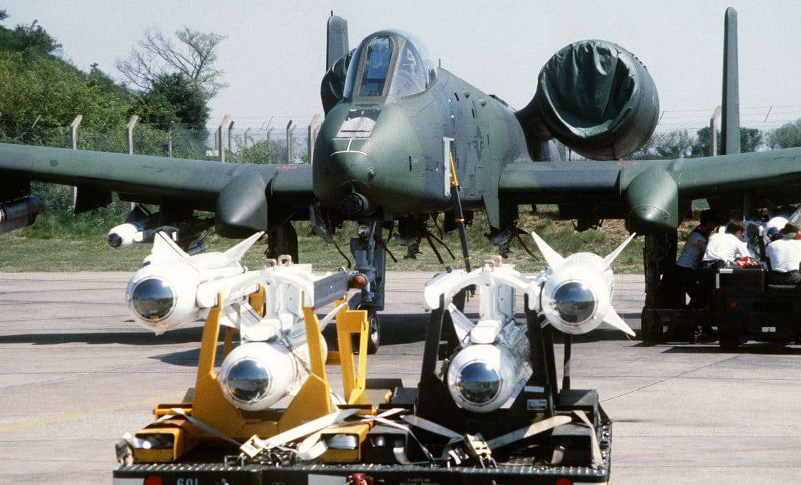 A-10 being loaded with guided munitions. 