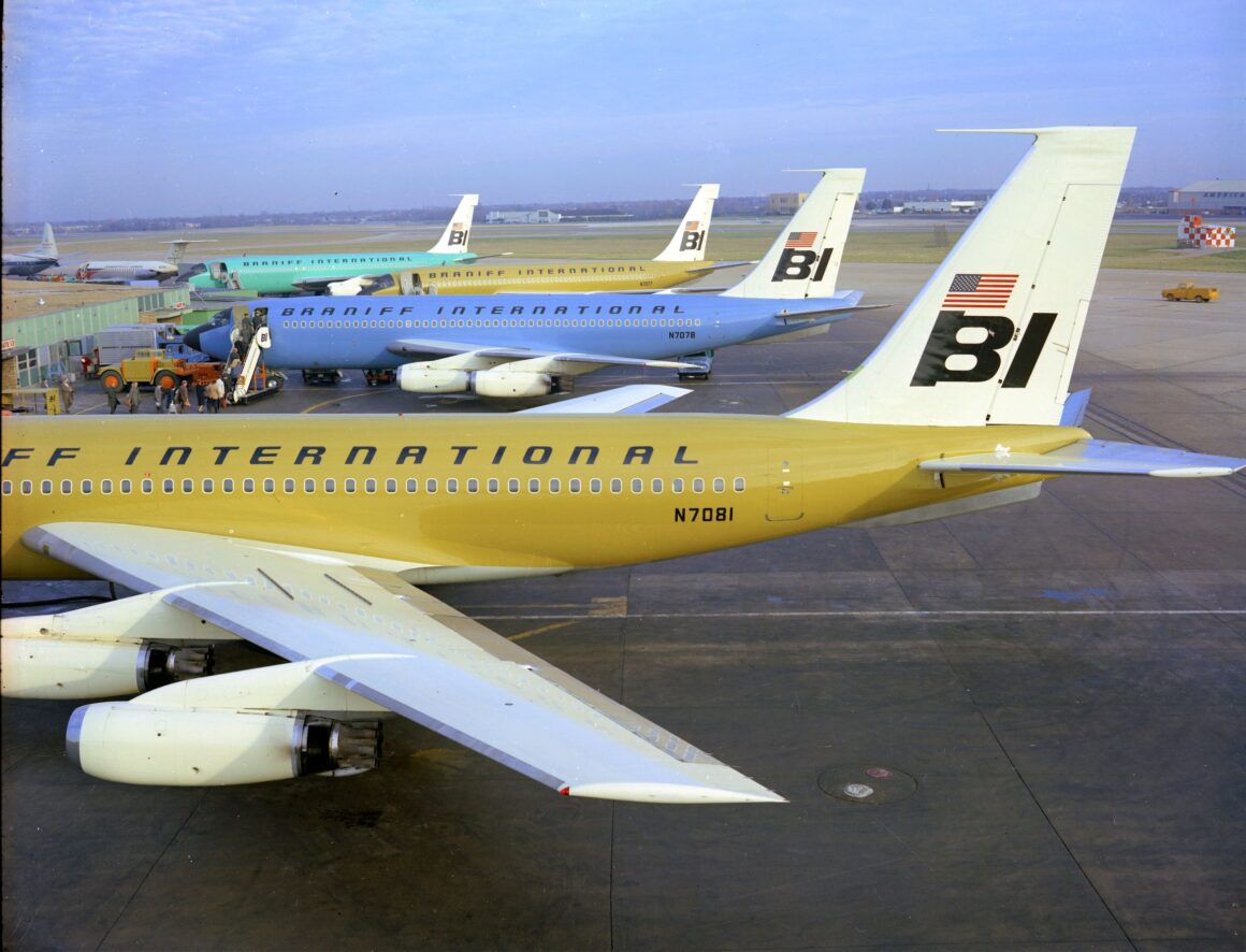 A group of Braniff Boeing 720s, wearing new look Easter egg colors, was photographed at Dallas Love Field. Note the Lockheed Electra and BAC One-Eleven at upper left still wearing the airline's old livery. Photo copyright Braniff Airways, Inc. All rights reserved.