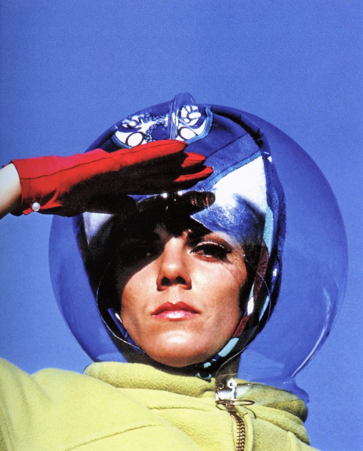 The flight attendant uniform included a space bubble hat, called the Raindome, to protect against inclement weather. Photo courtesy of Airways Magazine