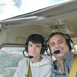 Jared with his son Gavin on a flight lesson. Gavin's legacy lives on with him memorial scholarship.