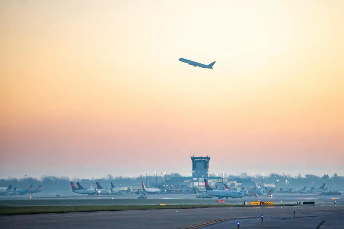 A plane silhouetted against the rising sun at Cincinnati/Northern Kentucky International Airport