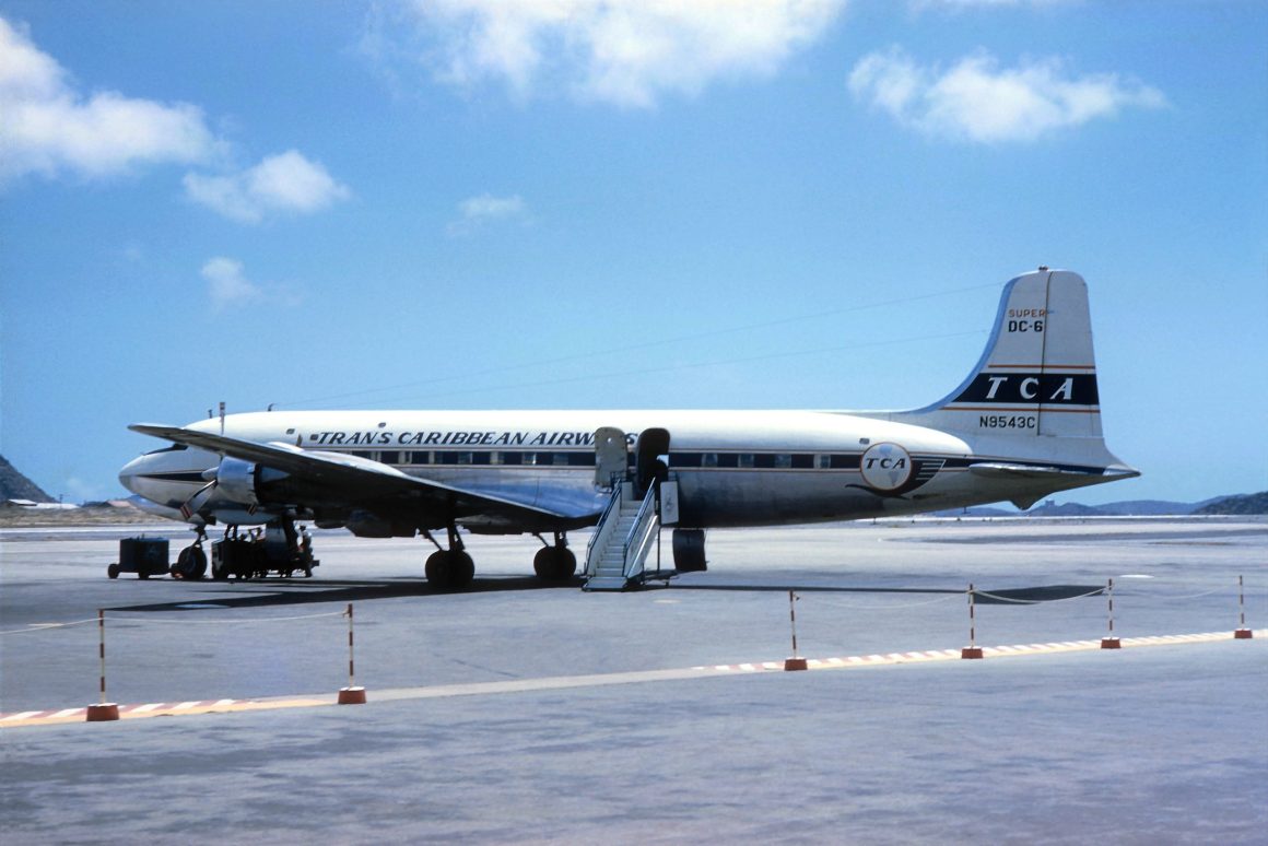 DC-6B N9543C awaits its next group of passengers. PAUL ZOGG COLLECTION