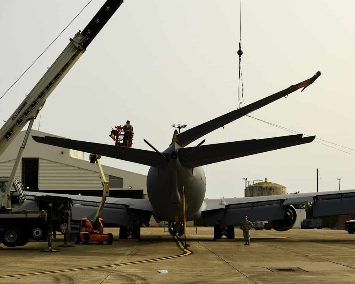 Guardsmen from the 171st Air Refueling Wing execute a fin fold on a KC-135 Stratotanker