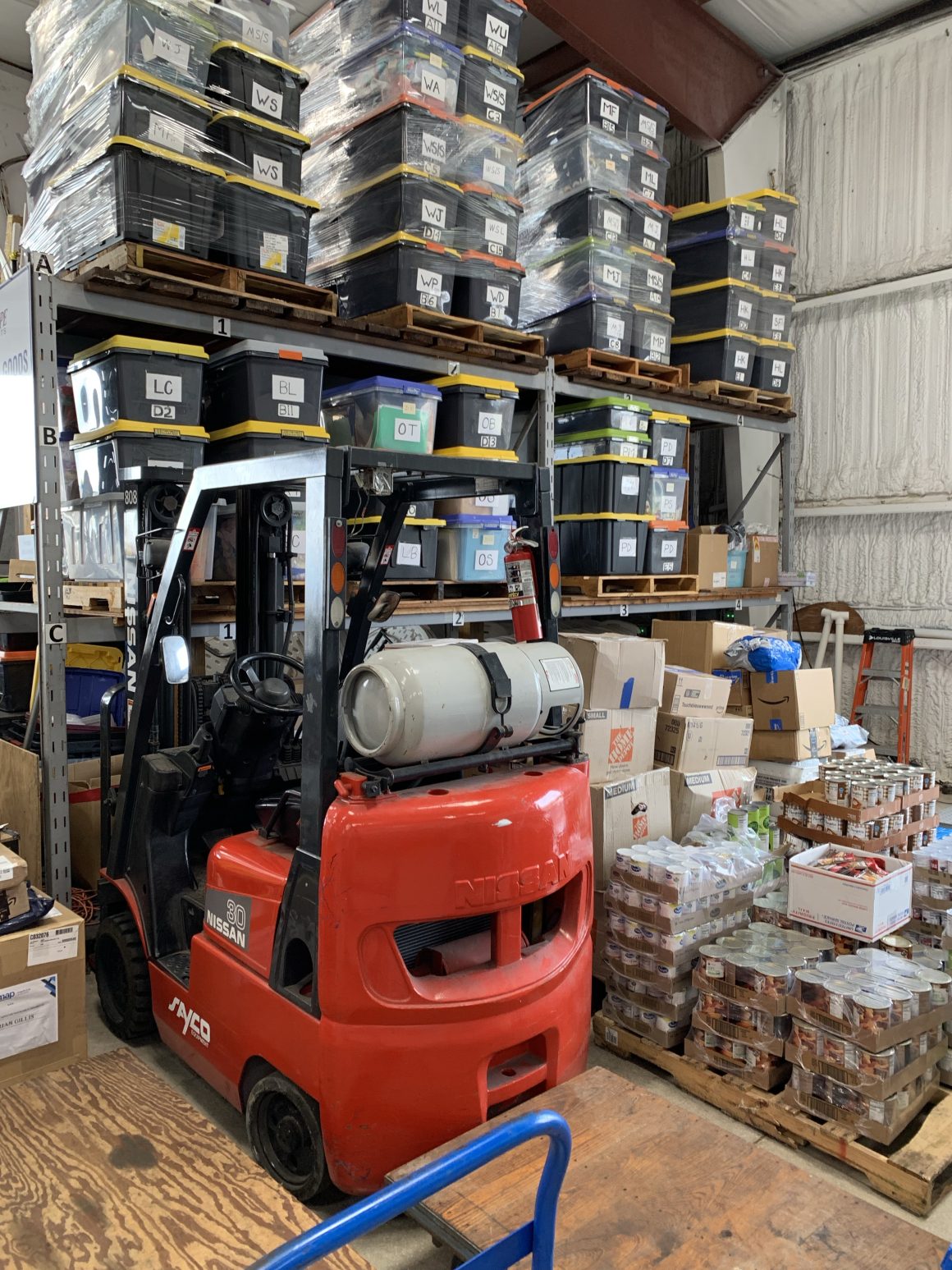 Inside Agape Flights: An Aviation Ministry Bringing Hope to the Caribbean 14 AGAPE Flights hangar filled with supplies waiting for loading on aircraft for delivery to aviation ministry partners in Caribbean