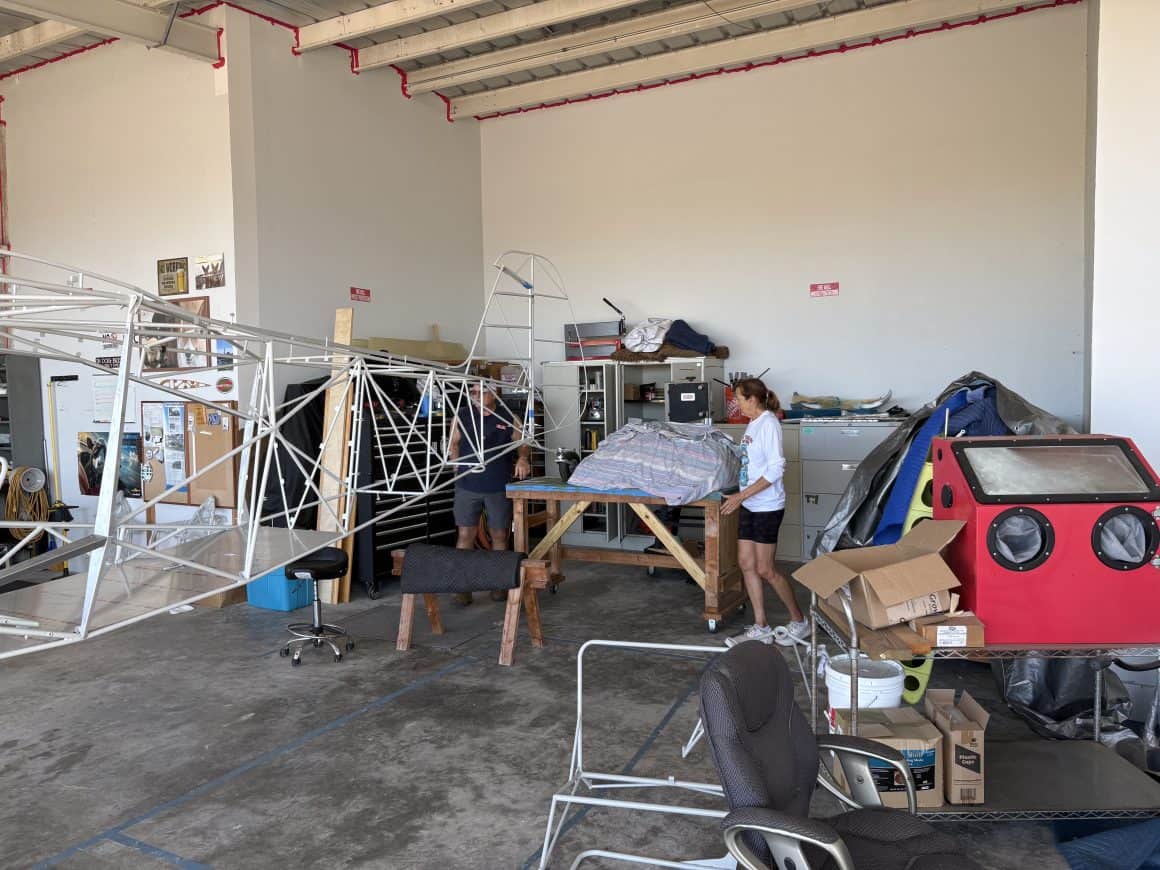Bob Willaford and Lauren Thomas working on their Bearhawk B kit plane.