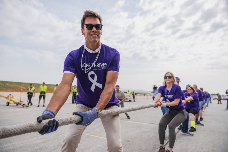 Tom Brady Tugs a Massive 757 During Annual Delta Jet Drag