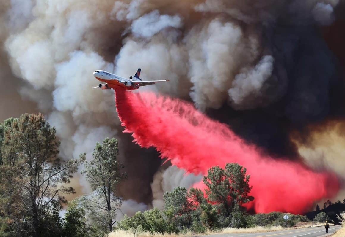 A DC-10 aerial firefighting tanker drops a load | IMAGE: 10 Tanker
