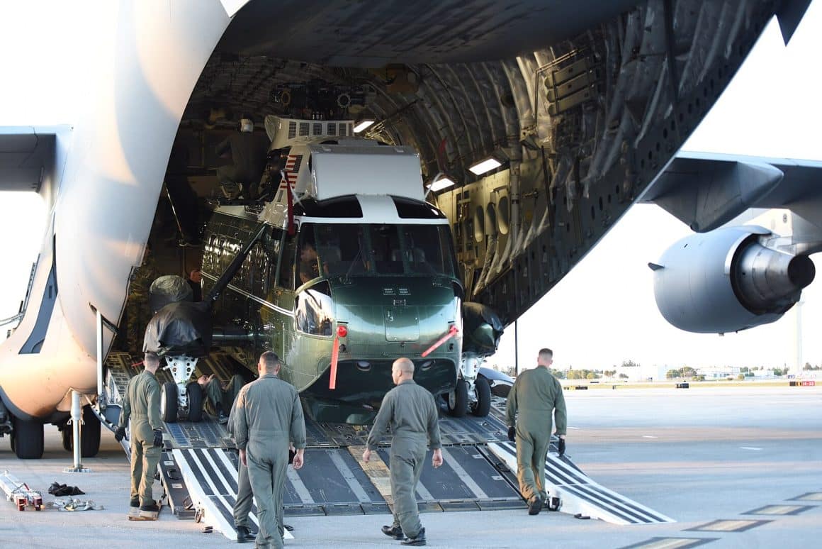 US Marines unload Marine One from a C-17