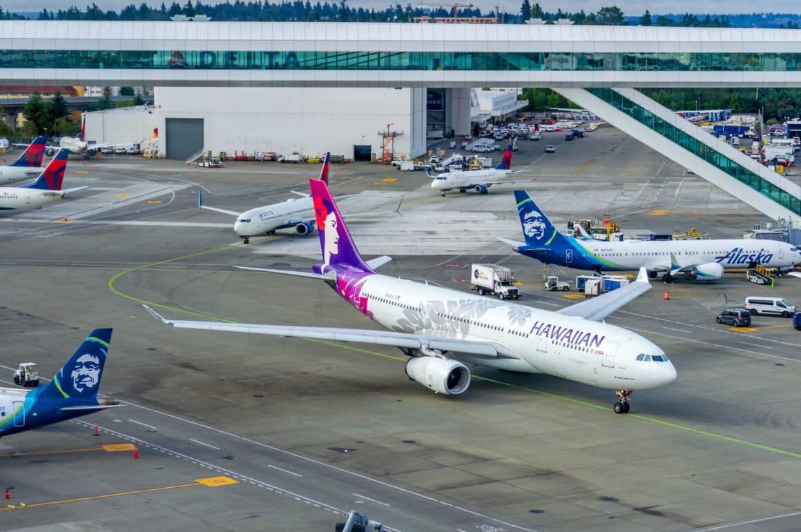 Alaska and Hawaiian Airlines jets share ramp space at SeaTac