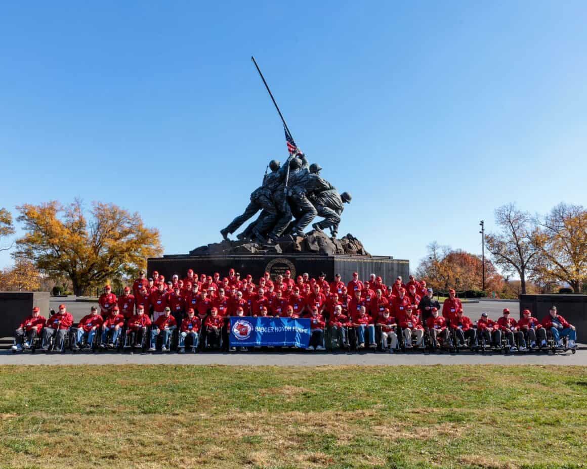 Honor Flight Network: The Mission Bringing Veterans to D.C.—and the Surprise They’ll Never Forget 6 Veterans from the Badger Honor Flight Network gather for a group photo in front of the US Marine Corps War Memorial on 8 Nov 25