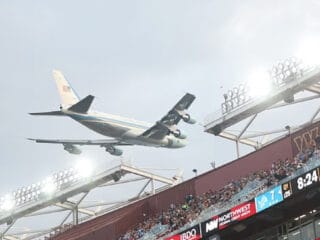 Air Force One performs a flyover at the Commanders-Lions game on 9 Nov 2025
