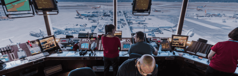 Air traffic controllers in a tower