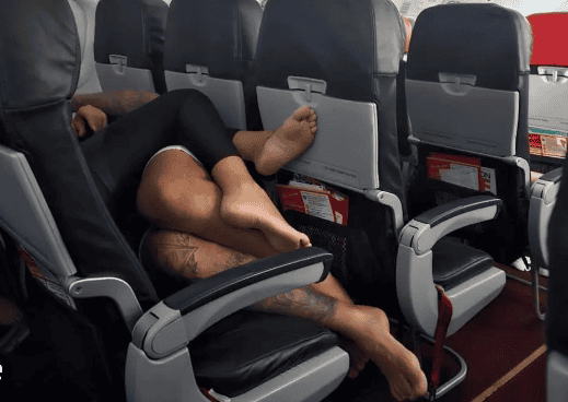 From Gate Lice to Good Manners: Sean Duffy Wants Air Travel to Calm Down 3 Bare feet on tray tables