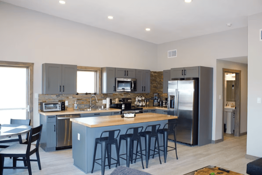 Inside the Stunning Boeing 727 Home in Texas: An AvGeek’s $2.1 Million Desert Dream 7 Upper level kitchen