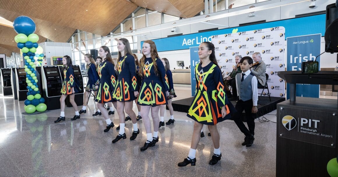 Aer Lingus Pittsburgh Flights Announced With New Dublin Route Starting in 2026 3 Irish dancers perform on 12 Dec 2025 at Pittsburgh International Airport at the announcement of Aer Lingus service