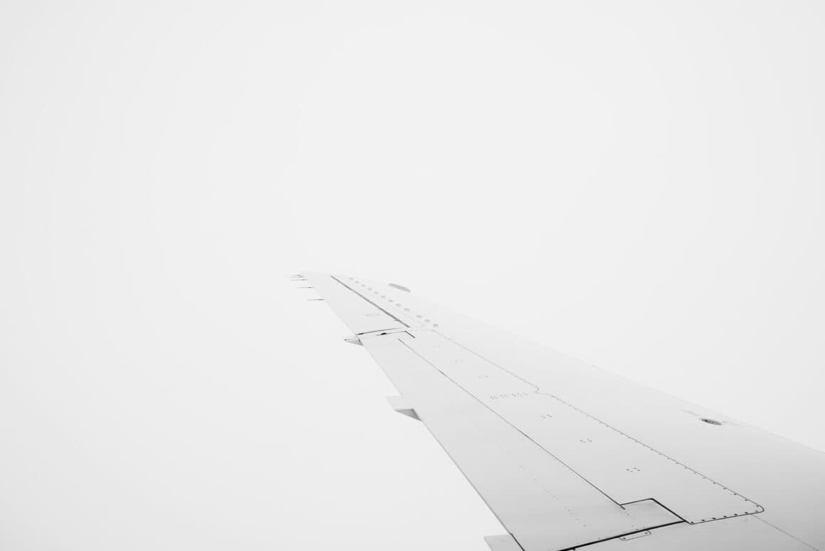 An aircraft navigating through thick fog