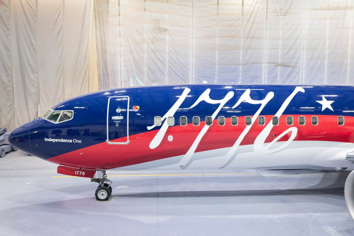 Southwest Independence One features a patriotic red, white, and blue livery with 1776 in a giant quill script on the forward fuselage