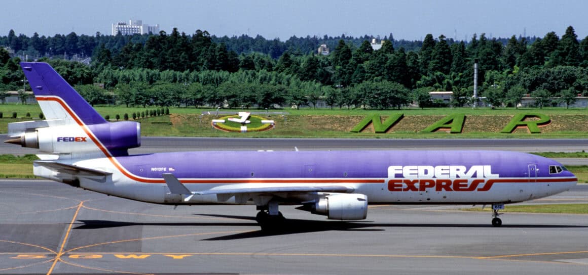FedEx MD-11 at NRT in 1994, featuring the company's iconic purple livery