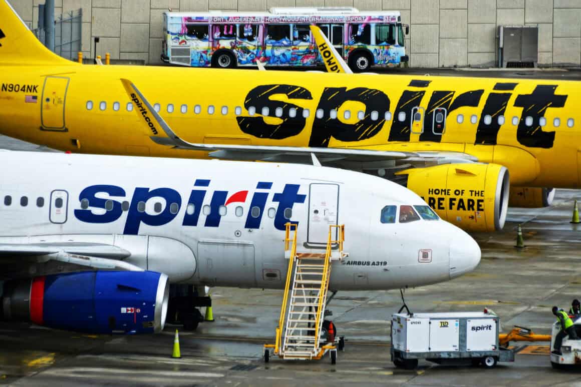 A pair of Spirit Airbus aircraft – an A319 (front) and an A320 (back) – on the ramp at Fort Lauderdale - Hollywood International Airport (FLL) in 2018 
